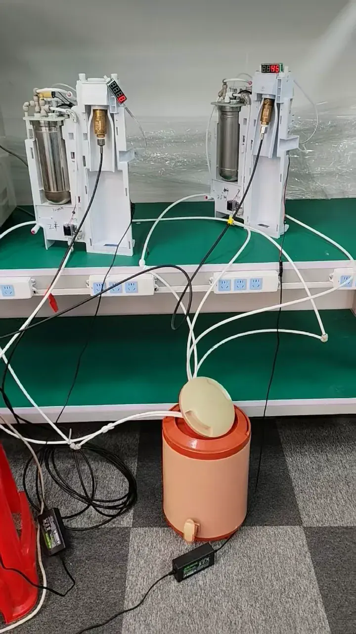 Multi-station life-cycle test rigs on a workbench, each with a cycle counter
