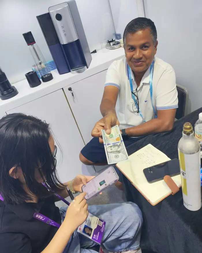 A buyer going through the machines with our team